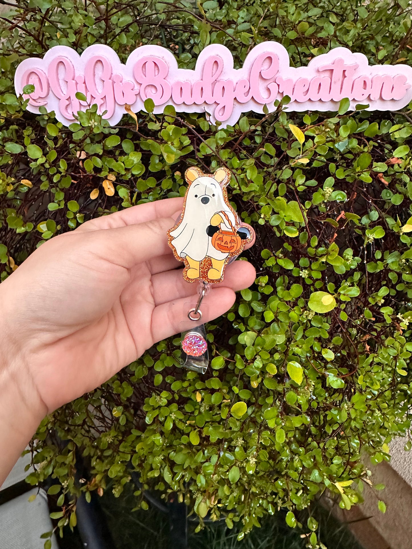 Pooh w Halloween Basket Badge Reel