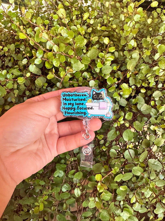 Unbothered Cat Badge Reel