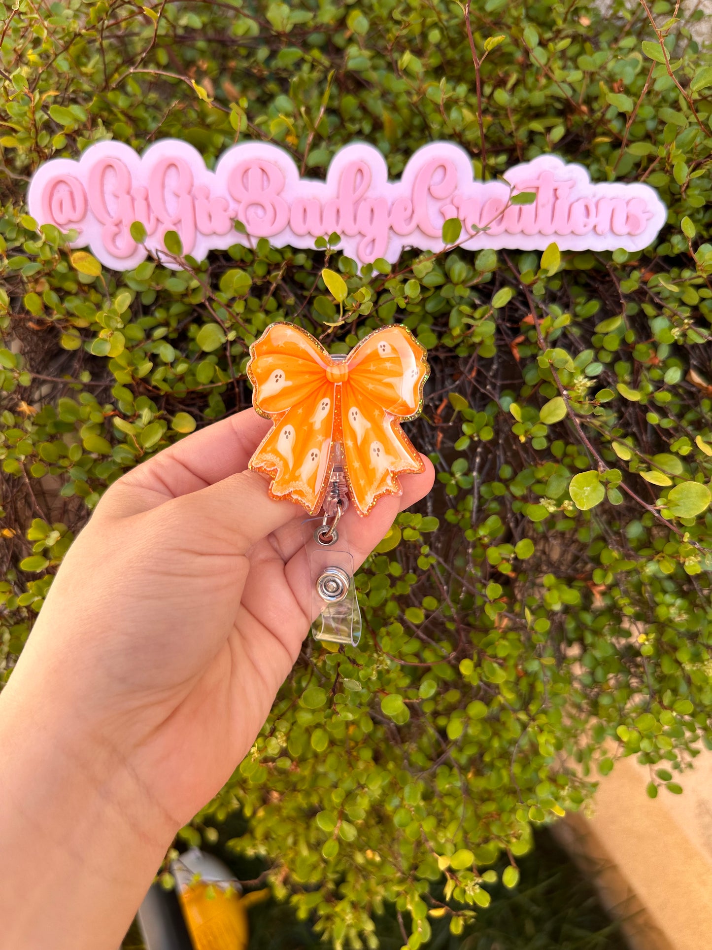 Orange Ghost Bow Badge Reel