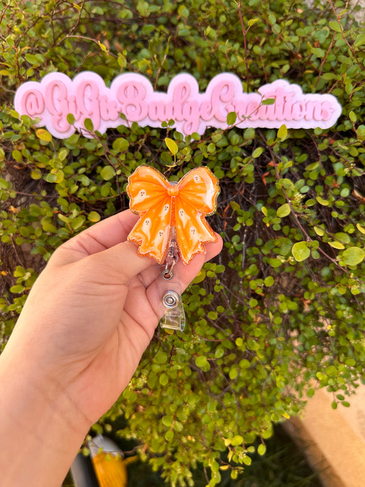 Orange Ghost Bow Badge Reel